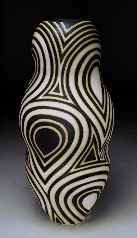 Porcelain Figure With Circles 24x11