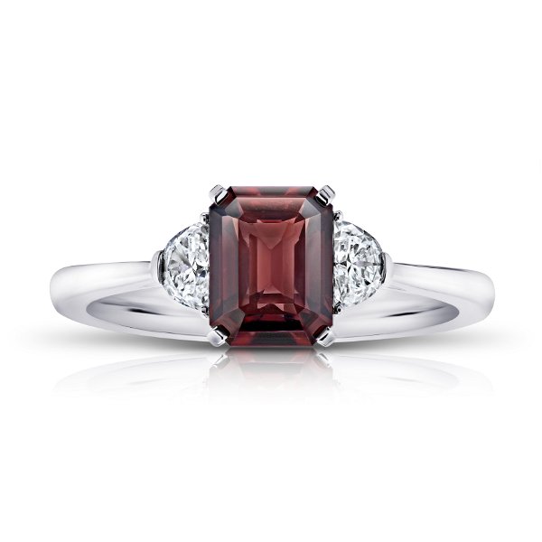 Closeup photo of 2.08 Carat Emerald Cut Reddish Brown Sapphire and Diamond Ring in Platinum