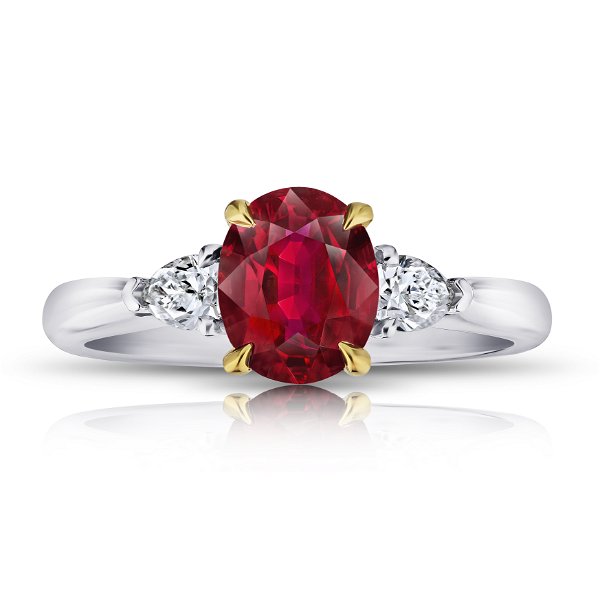 Closeup photo of 1.72 Carat Oval Red Ruby and Diamond Ring in Platinum and 18kt Yellow Gold