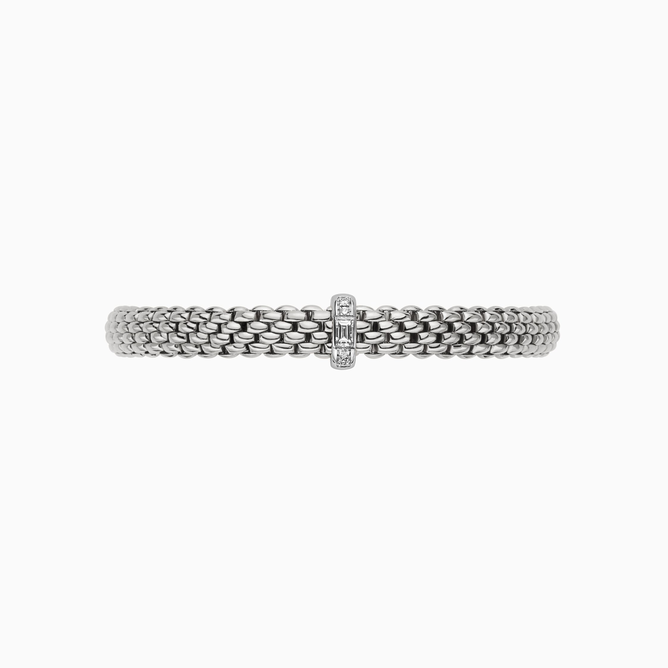 Vendome Flex'It Bracelet in 18kt White Gold with one White Gold and White Mixed Cut Diamond Element - Four Brilliant Round Cuts and one Baguette Cut at 0.24ctw - The bracelet measures 6.9mm wide by 4.3mm deep and is a size medium, 17cm or 6.69 inches internal circumference. 583B BBRM-W Vendome Bracelet in 18kt White Gold with 1 White Gold and Brilliant and Baguette Cut White Diamond Element - 6.9mm - Size M