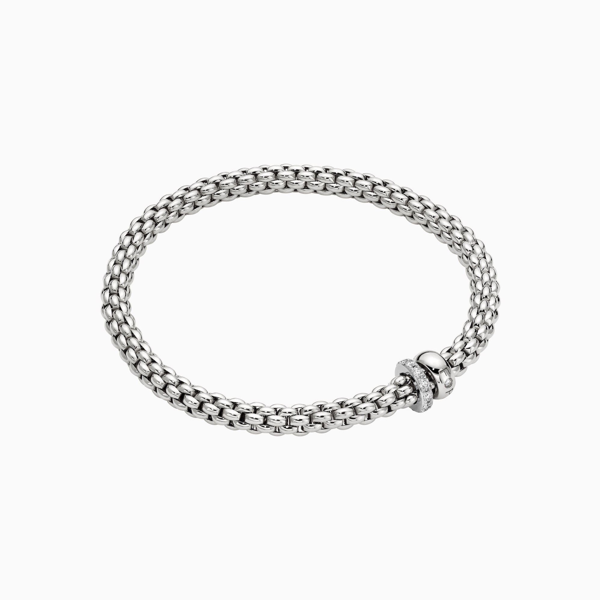 Solo Flex'It Bracelet in 18kt White Gold with one plain white gold elements and one White Gold and White Pave Diamond Element at 0.29ctw - The bracelet measures 4.9mm in diameter and is a size large, 18cm or 7.08 inches internal circumference. 62406B PAVEL-W Solo Bracelet in 18kt White Gold with 1 Plain White Gold and 1 White Gold and White Diamond Pave Element - 4.9mm - Size L