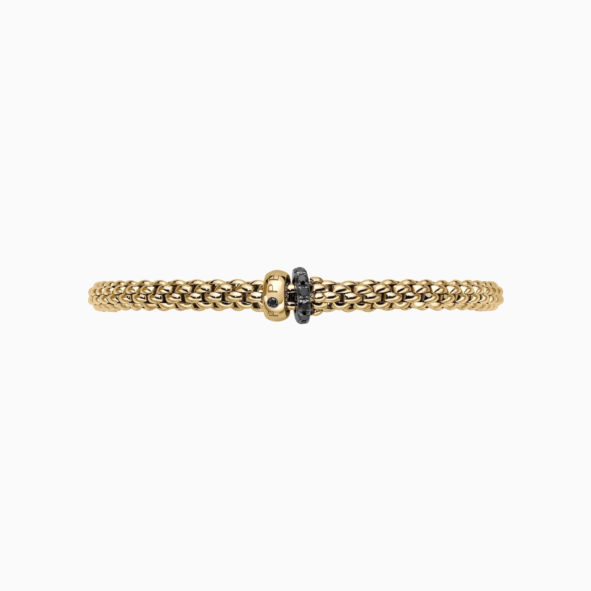 Solo Flex'It Bracelet in 18kt Yellow Gold with one plain yellow gold elements and one White Gold and Black Pave Diamond Element at 0.30ctw - The bracelet measures 4.9mm in diameter and is a size small, 16cm or 6.29 inches internal circumference. 62406B PAVENS-Y Solo Bracelet in 18kt Yellow Gold with 1 Plain Yellow Gold and 1 White Gold and Black Diamond Pave Element - 4.9mm - Size S