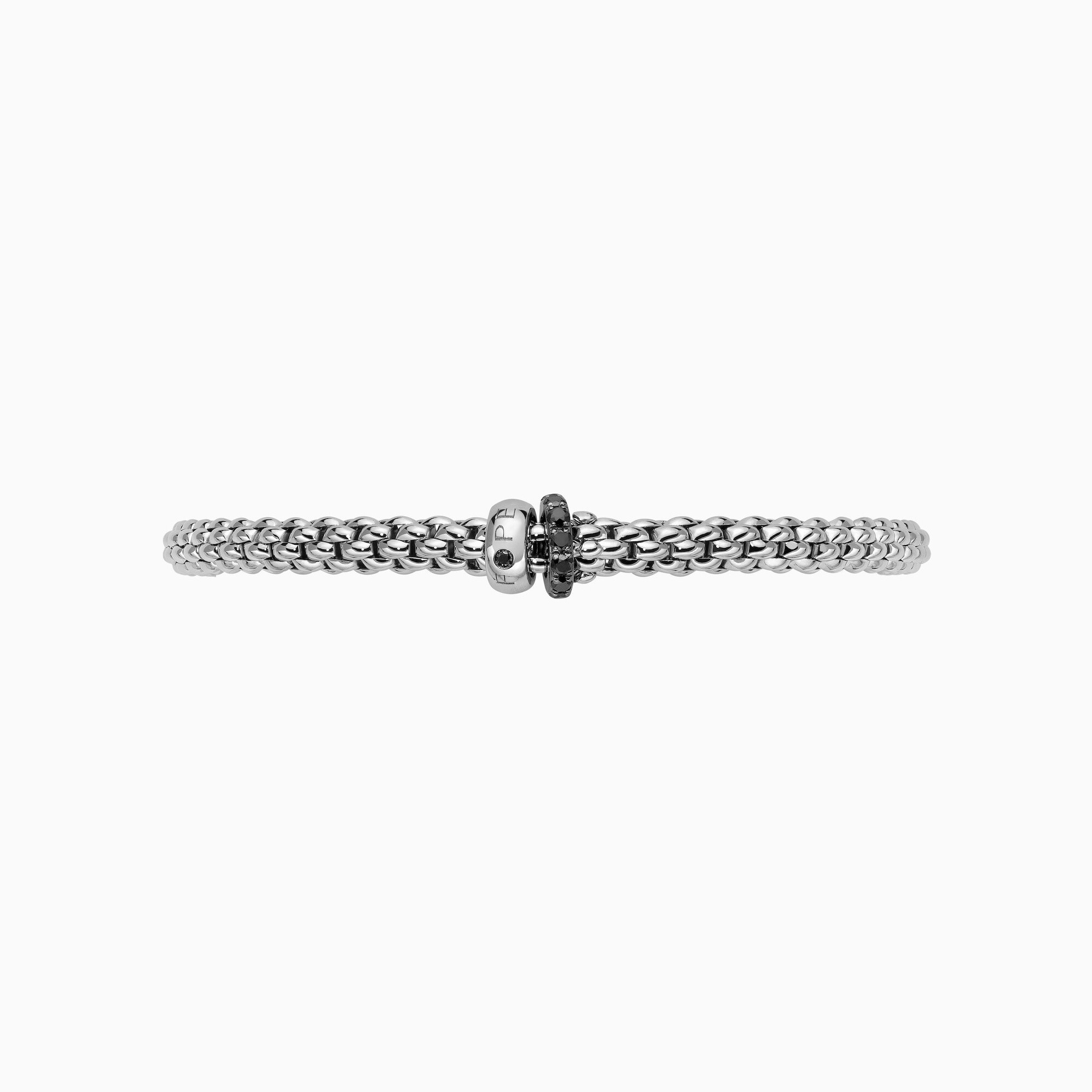 Solo Flex'It Bracelet in 18kt White Gold with one plain white gold elements and one White Gold and Black Pave Diamond Element at 0.30ctw - The bracelet measures 4.9mm in diameter and is a size extra large, 19cm or 7.48 inches internal circumference. 62406B PAVENXL-W Solo Bracelet in 18kt White Gold with 1 Plain White Gold and 1 White Gold and Black Diamond Pave Element - 4.9mm - Size XL