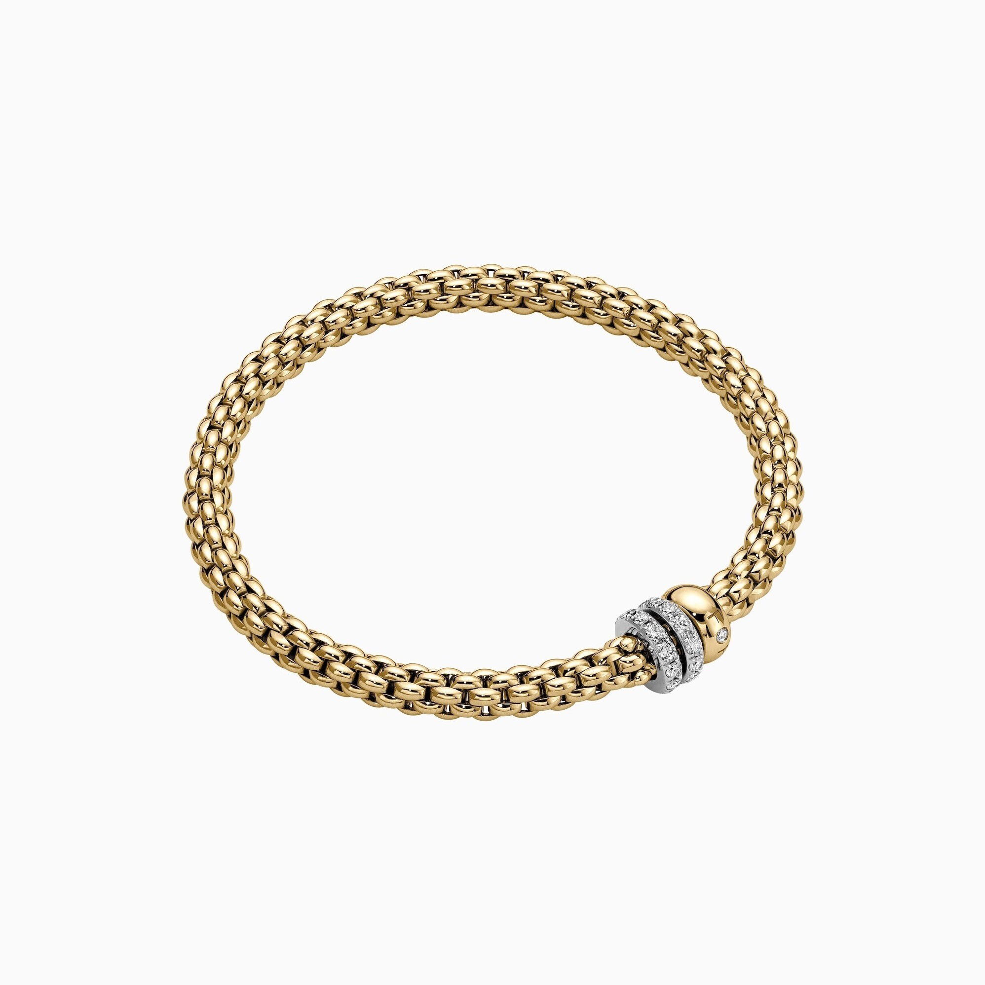 Solo Flex'It Bracelet in 18kt Yellow Gold with one plain yellow gold elements and two White Gold and White Pave Diamond Elements at 0.56ctw - The bracelet measures 4.9mm in diameter and is a size large, 18cm or 7.08 inches internal circumference. 62506B PAVEL-YW Solo Bracelet in 18kt Yellow Gold with 1 Plain Yellow Gold and 2 White Gold and White Diamond Pave Elements - 4.9mm - Size L