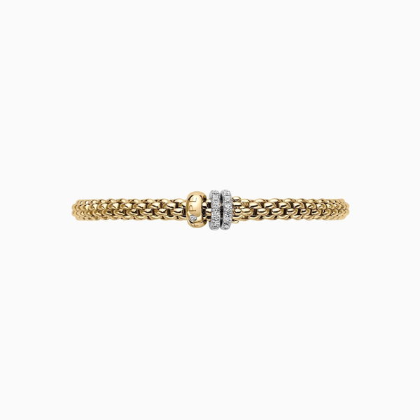 Closeup photo of Solo Bracelet in 18kt Yellow Gold with 1 Plain Yellow Gold and 2 White Gold and White Diamond Pave Elements - 4.9mm - Size M