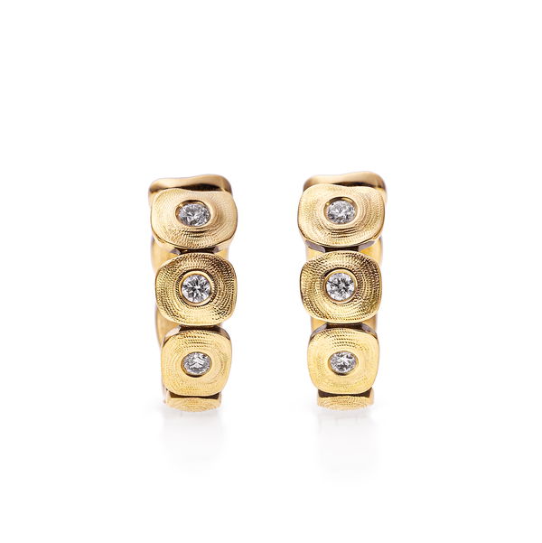 Closeup photo of Dancing Squares Huggie Earrings with White Diamonds in 18kt Yellow Gold