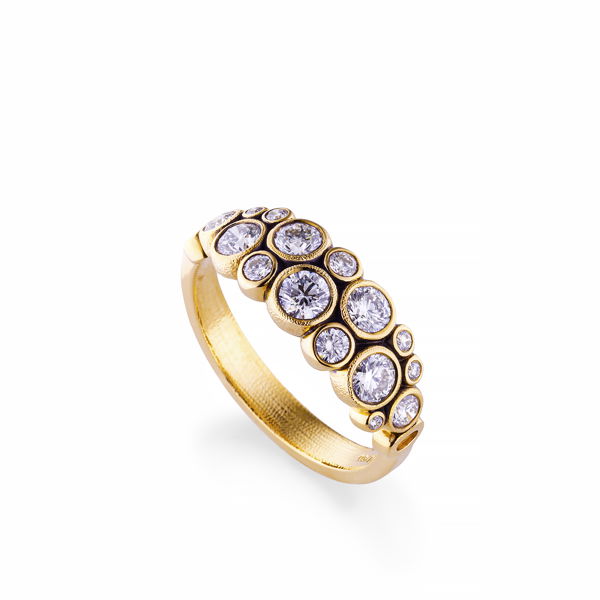 Closeup photo of Bezel Set White Diamond Ring in 18kt Yellow Gold