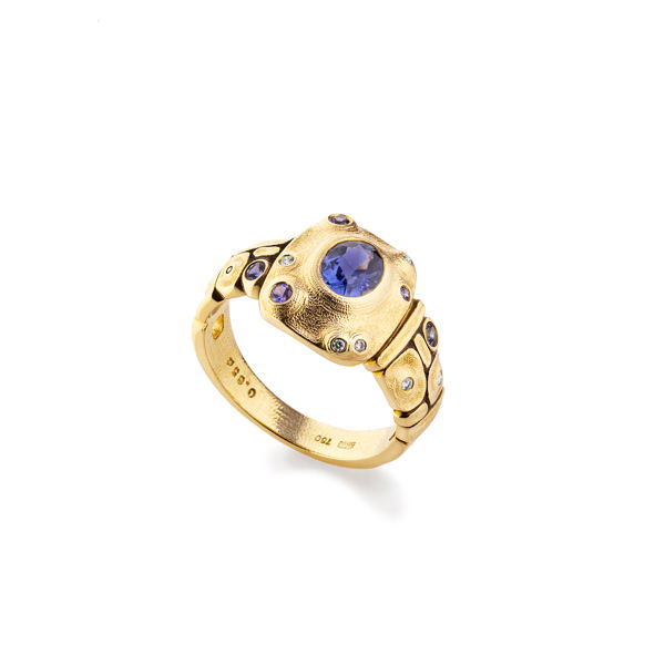 Closeup photo of Lagoon Ring Mounting with 0.65ct Color Change Blue Sapphire and Violet Sapphires in 18kt Yellow Gold