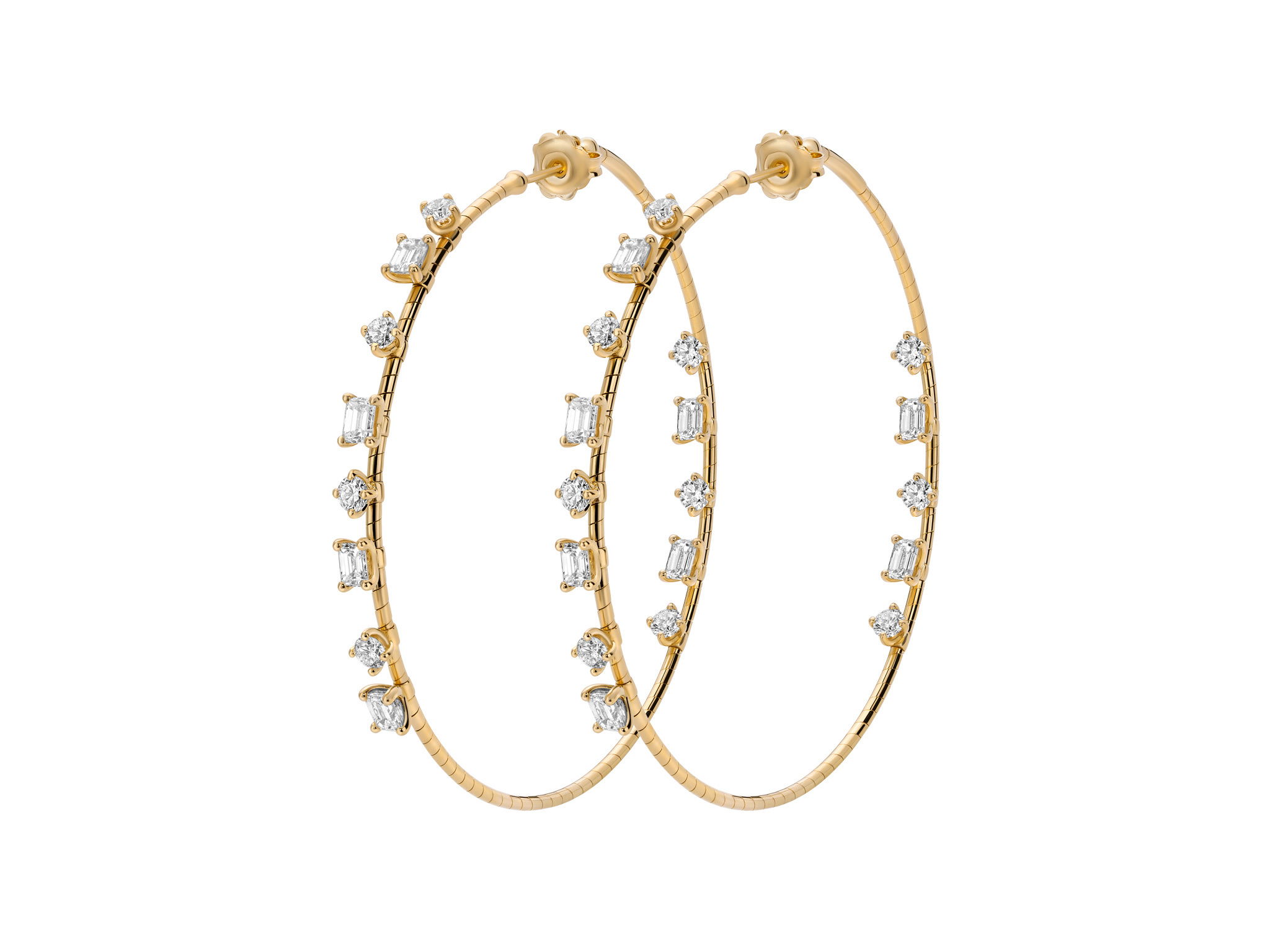 NOVELTIES 6cm Hoop Earrings with White Diamonds in 18kt Yellow Gold by Mattia Cielo. From the NOVELTIES Collection, these earrings are created in 18kt yellow gold with a titanium core. The earrings are set with twelve emerald cut and fourteen round brilliant cut natural white diamonds at 4.96ctw, G/VS quality. The hoop earrings are 6cm in diameter. NOVELTIES 6cm Hoop Earrings with White Diamonds in 18kt Yellow Gold