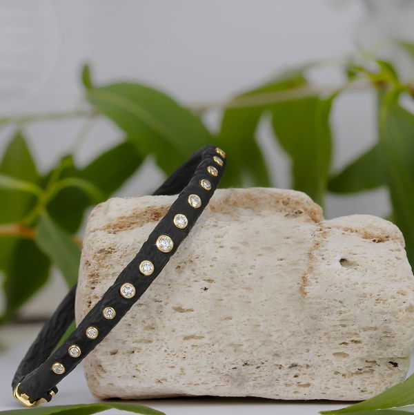 Closeup photo of Pebble Bold Hinged Cuff Bracelet with White Diamonds in Black Chrome