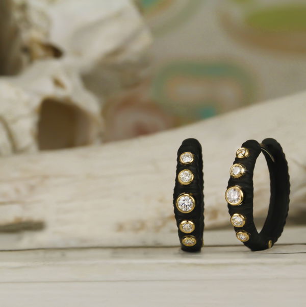 Closeup photo of Pebble Bold Hinged 25mm Hoop Earrings with White Diamonds in Black Chrome