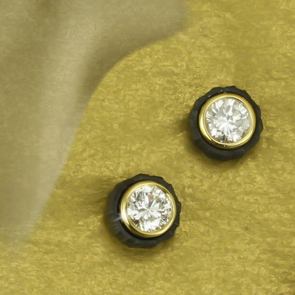 Closeup photo of Chroma Stud Earrings with White Diamonds in 18kt Yellow Gold and Black Chrome