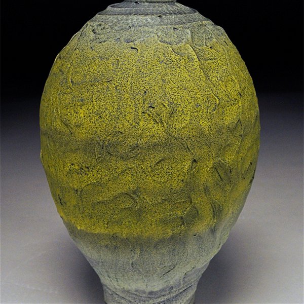 Closeup photo of Earthenware yellow stone urn 12x7.5