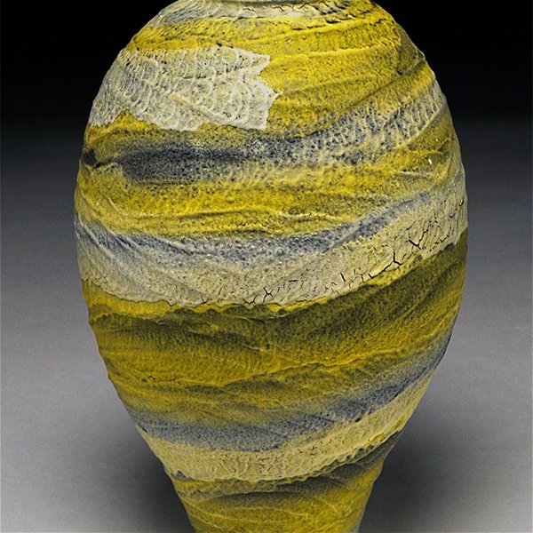 Closeup photo of Earthenware yellow bands urn 11.5x7