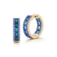 Origami Mini Huggie Hoop Earrings with Emeralds and White Diamonds in 18kt Yellow Gold and Blue Rhodium by Katherine Jetter. Inside-out hoop earrings with 1.75ctw of emeralds surrounded by white diamonds at 0.70ctw and set in 18kt yellow gold with blue rhodium. Origami Mini Huggie Hoop Earrings with Emeralds and White Diamonds in 18kt Yellow Gold and Blue Rhodium