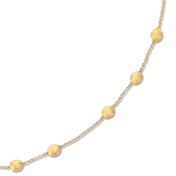 Closeup photo of Dancing in the Rain Gold Soffio Boules Necklace in 18kt Yellow Gold
