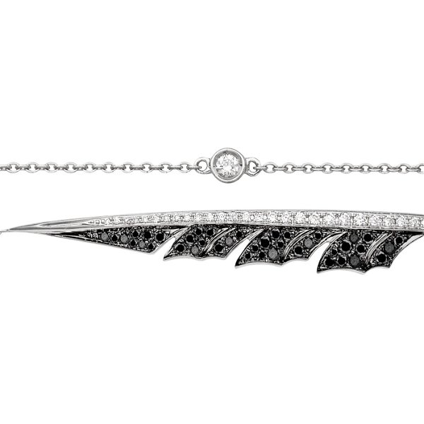 Closeup photo of Magnipheasant Plume Chain Bracelet with Black and White Diamonds in 18kt White Gold