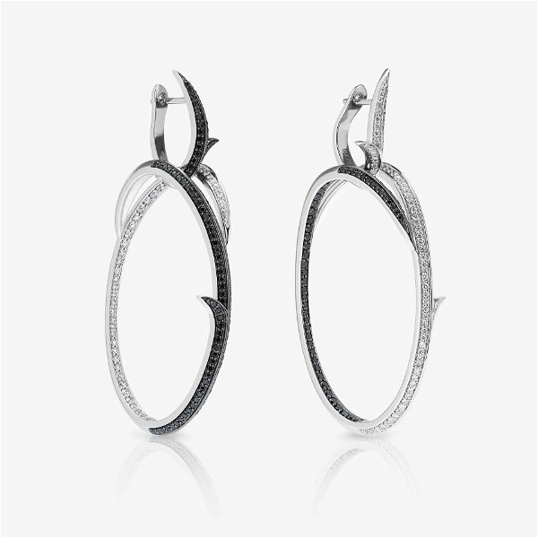 Closeup photo of Thorn Embrace Infinity Hoop Earrings with Black and White Diamonds in 18kt White Gold