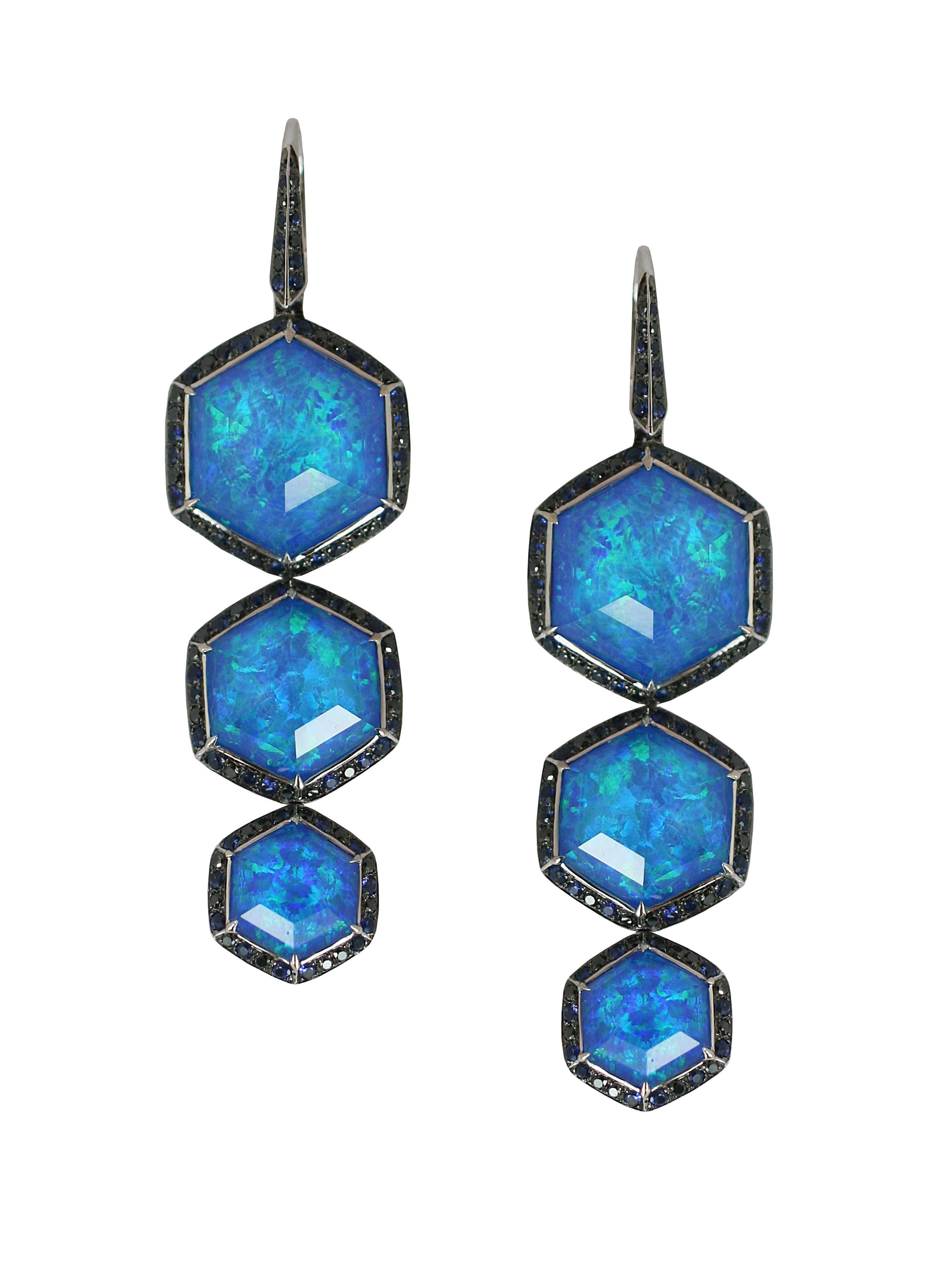 No Regrets Deco Haze CH2 Long Drop Earrings with Black Opalescent in 18kt White Gold by Stephen Webster. Dangle three tier drop earrings in 18kt white gold with black opalescent and quartz Crystal Haze at 27.28ctw accented with pave blue sapphires at 1.42ctw and pave black diamonds at 0.68ctw. No Regrets Deco Haze CH2 Long Drop Earrings with Black Opalescent in 18kt White Gold
