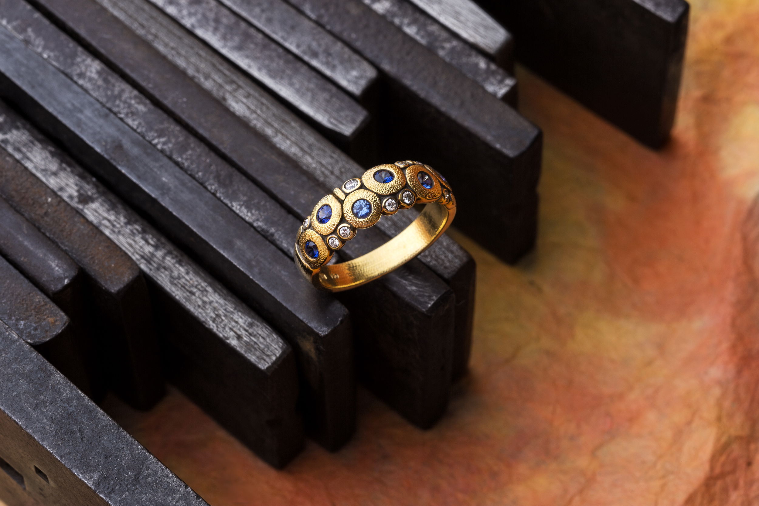 Candy Ring with Blue Sapphire Mix in 18kt Yellow Gold by Alex Sepkus. A mix of six blue sapphires of various shades of blue at 0.50ctw with nine white diamonds at 0.12ctw all set in oxidized 18kt yellow gold. Candy Ring with Blue Sapphire Mix in 18kt Yellow Gold