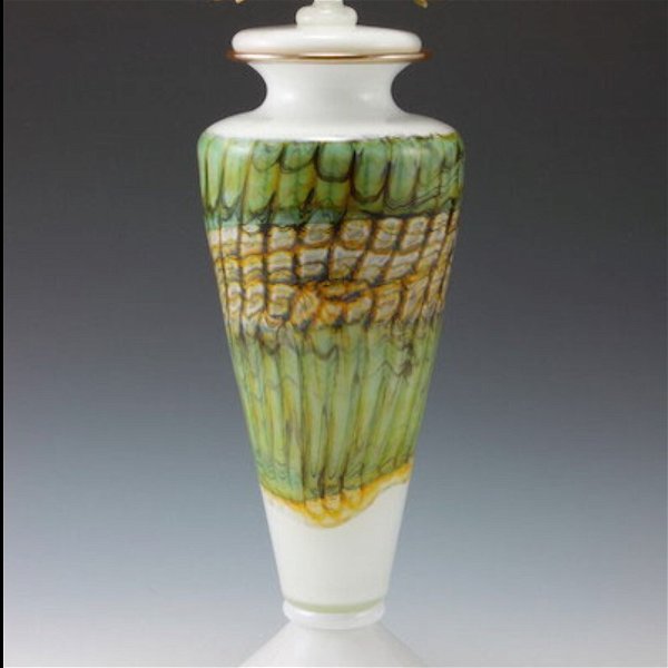 Closeup photo of White Opal Tall Footed Glass Vessel with Avian Finial