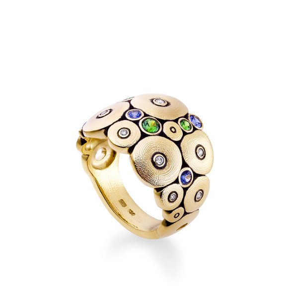 Closeup photo of Orchard Dome Ring with Blue Sapphires and Tsavorite in 18kt Yellow Gold