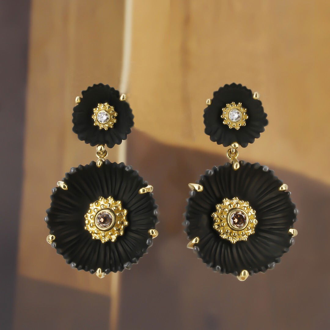 Flowering Coral Double Blossom Drop Earrings with White and Cognac Diamonds in Black Chrome and 18kt Yellow Gold by Sarah Graham. Smaller blossoms on the top set with 0.10ctw white diamonds, bezel set at the center of each top.? Larger blossoms drops are set with two natural color cognac diamonds at 0.50ctw set in oxidized cobalt chrome and 18kt yellow gold. Post with Omega back. Flowering Coral Double Blossom Drop Earrings with White and Cognac Diamonds in Black Chrome and 18kt Yellow Gold