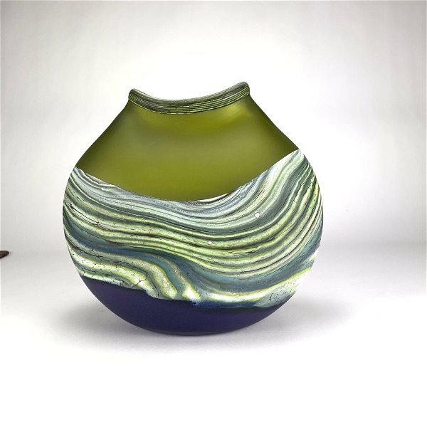 Closeup photo of Agate Flat Round Vessel in Lime and Amethyst Glass