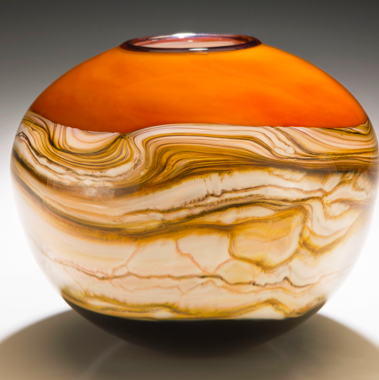 Closeup photo of Strata Small Sphere Vessel in Tangerine Glass