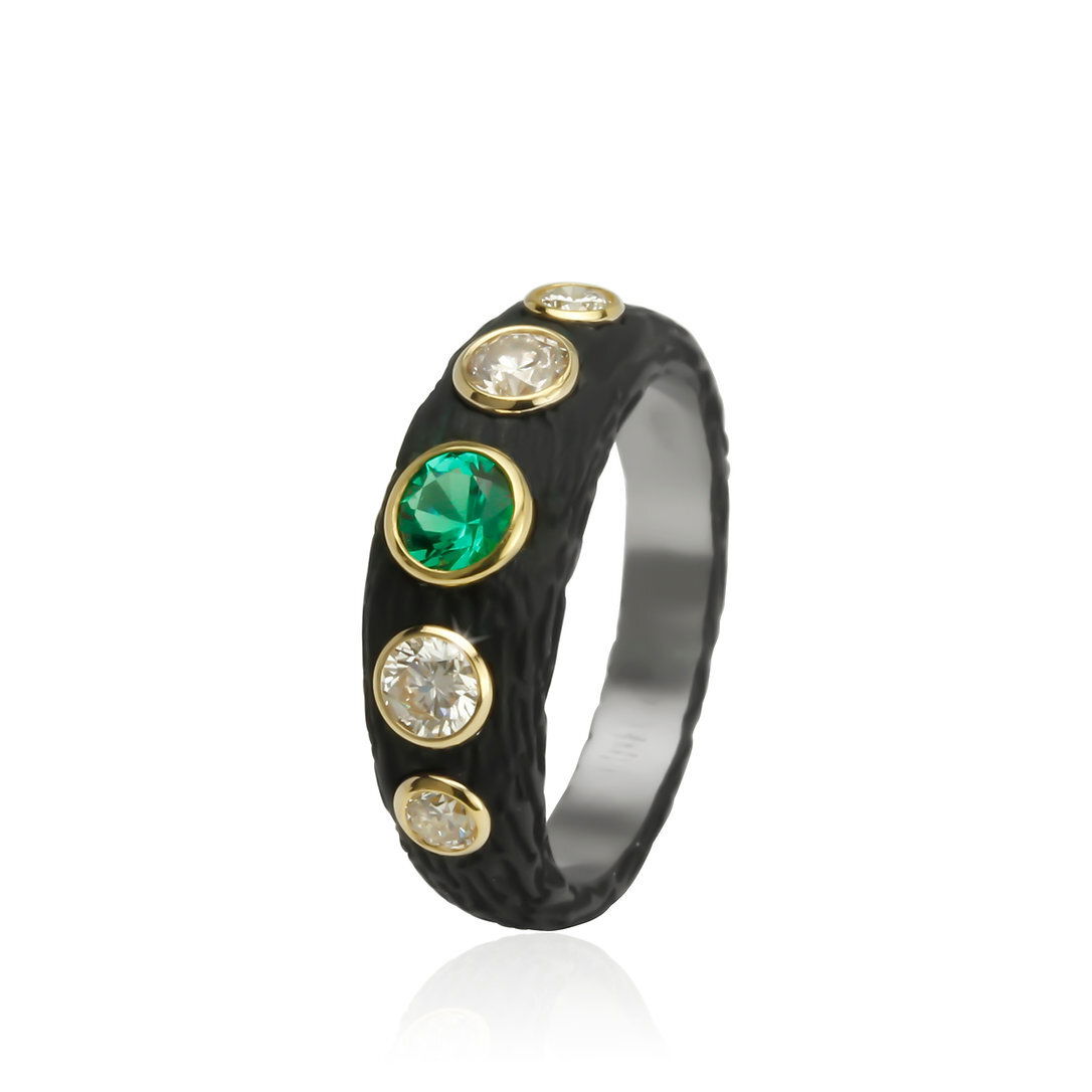 Pebble Bold Band Ring with Emerald and White Diamonds in Black Chrome and 18kt Yellow Gold by Sarah Graham. Band style ring in oxidized cobalt chrome with one 0.27ct emerald at the center and 0.45ctw white diamonds in 18kt yellow gold bezels. Pebble Bold Band Ring with Emerald and White Diamonds in Black Chrome and 18kt Yellow Gold