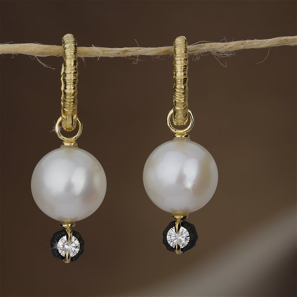 Closeup photo of Chroma Hoop Earrings with White Pearls and Diamonds in 18kt Yellow Gold and Black Chrome