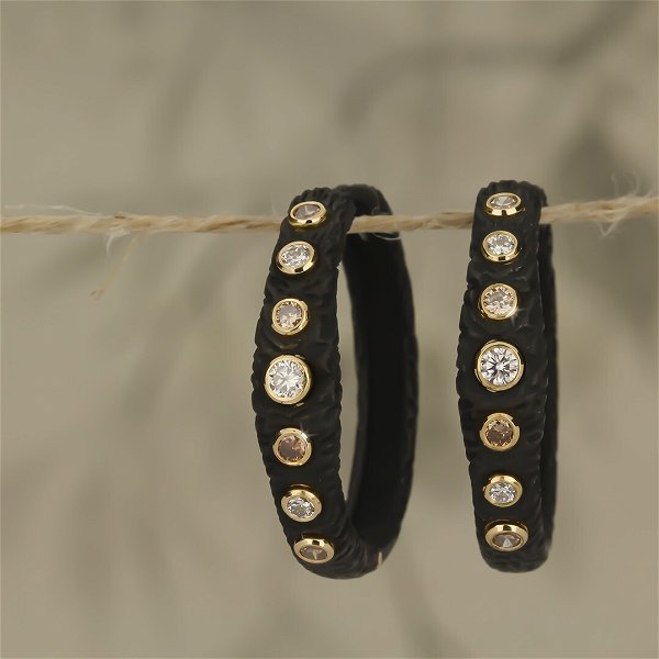 Closeup photo of Pebble Bold Hinged 25mm Hoop Earrings with White and Cognac Diamonds in Black Chrome