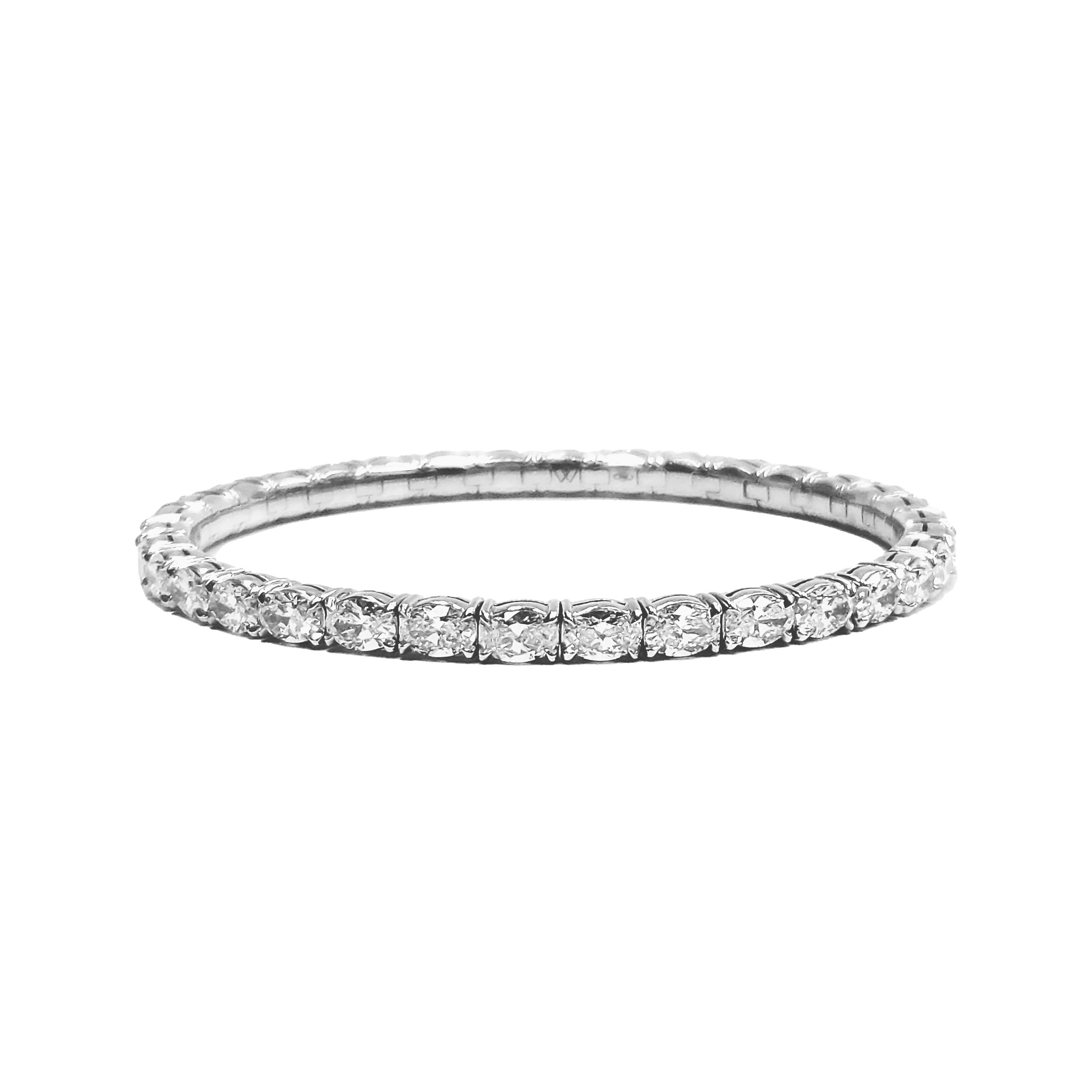 Single Line Stretch Bracelet with Oval Cut White Diamonds at 10.33ctw - DEF/VVS1-VS2 in 18kt White Gold