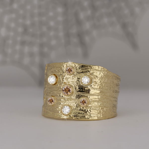 Closeup photo of Manzanita Cigar Band Ring with Cognac and White Diamonds in 18kt Yellow Gold