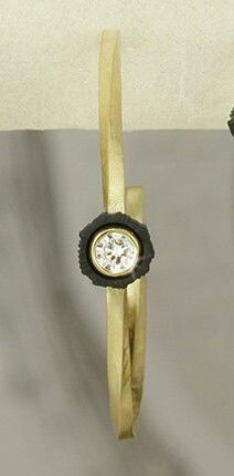 Twist 22mm Twisted Gold Link Hoop Earrings with White Diamonds in Black Chrome and 18kt Yellow Gold by Sarah Graham. Twisted gold hoop earrings measuring 22mm in diameter set with 0.20ctw of pave white diamonds. Twist 22mm Twisted Gold Link Hoop Earrings with White Diamonds in Black Chrome and 18kt Yellow Gold