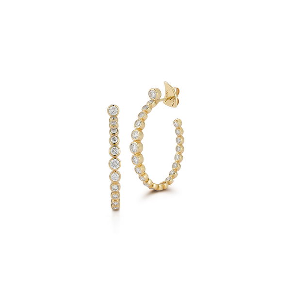 Closeup photo of Orta Hoop Earrings with White Diamonds in 18kt Yellow Gold