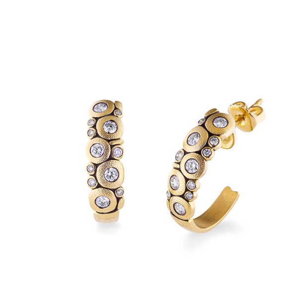 Closeup photo of Candy Larger Hoop Earrings with White Diamonds in 18kt Yellow Gold