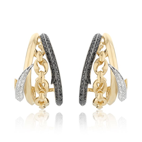 Closeup photo of Thorn Embrace Bound Together Cuff Earrings with White and Black Diamonds in 18kt Yellow Gold