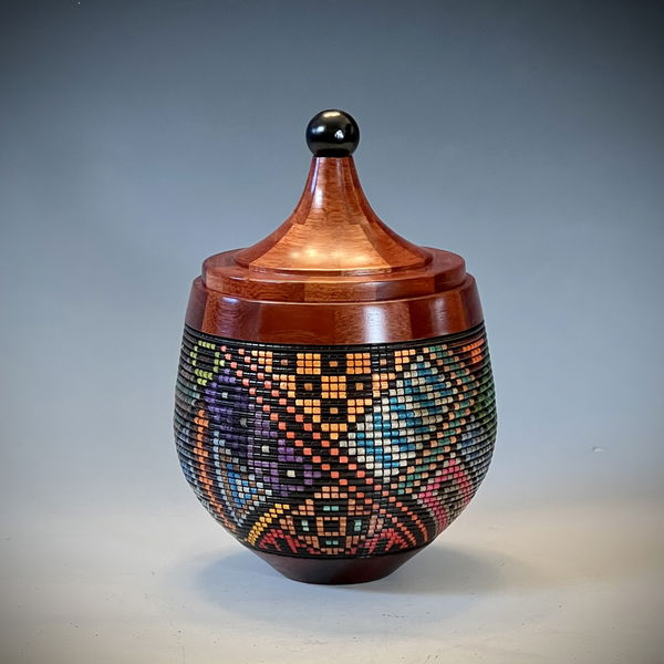 Closeup photo of Fancy Box in Bloodwood and Maple Wood with Black Ball