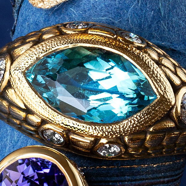 Closeup photo of Marquis Shape Ring with Paraiba Tourmaline and White Diamonds in 18kt Yellow Gold