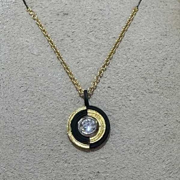 Paramount Yin Yang Pendant Necklace with White Diamond in 18kt Yellow Gold and Black Chrome Closeup photo of Paramount Yin Yang Pendant Necklace with White Diamond in 18kt Yellow Gold and Black Chrome