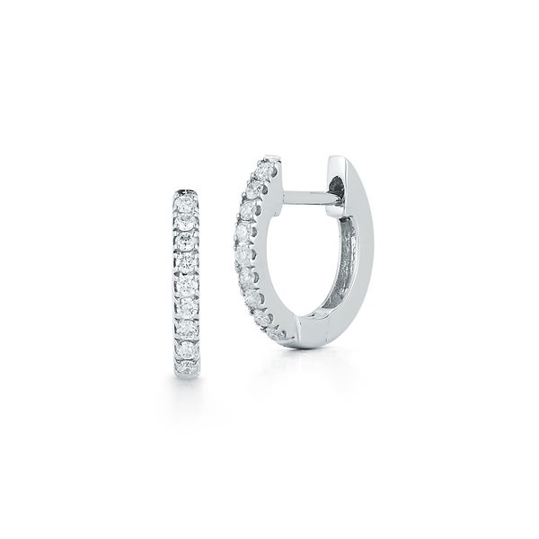 Closeup photo of Tiny Tennis Huggie Hoop Earrings with White Diamonds in 14kt White Gold