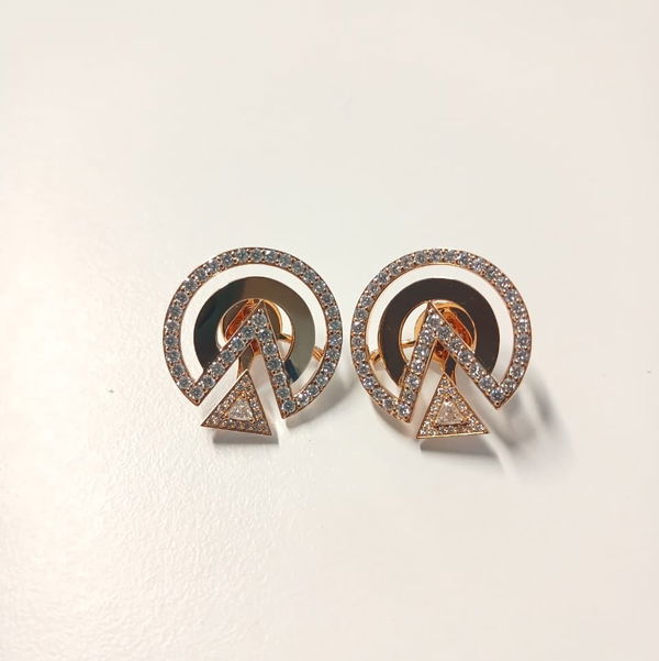 Closeup photo of Aura Triangle Pave White Diamond Earrings in 18kt Rose Gold