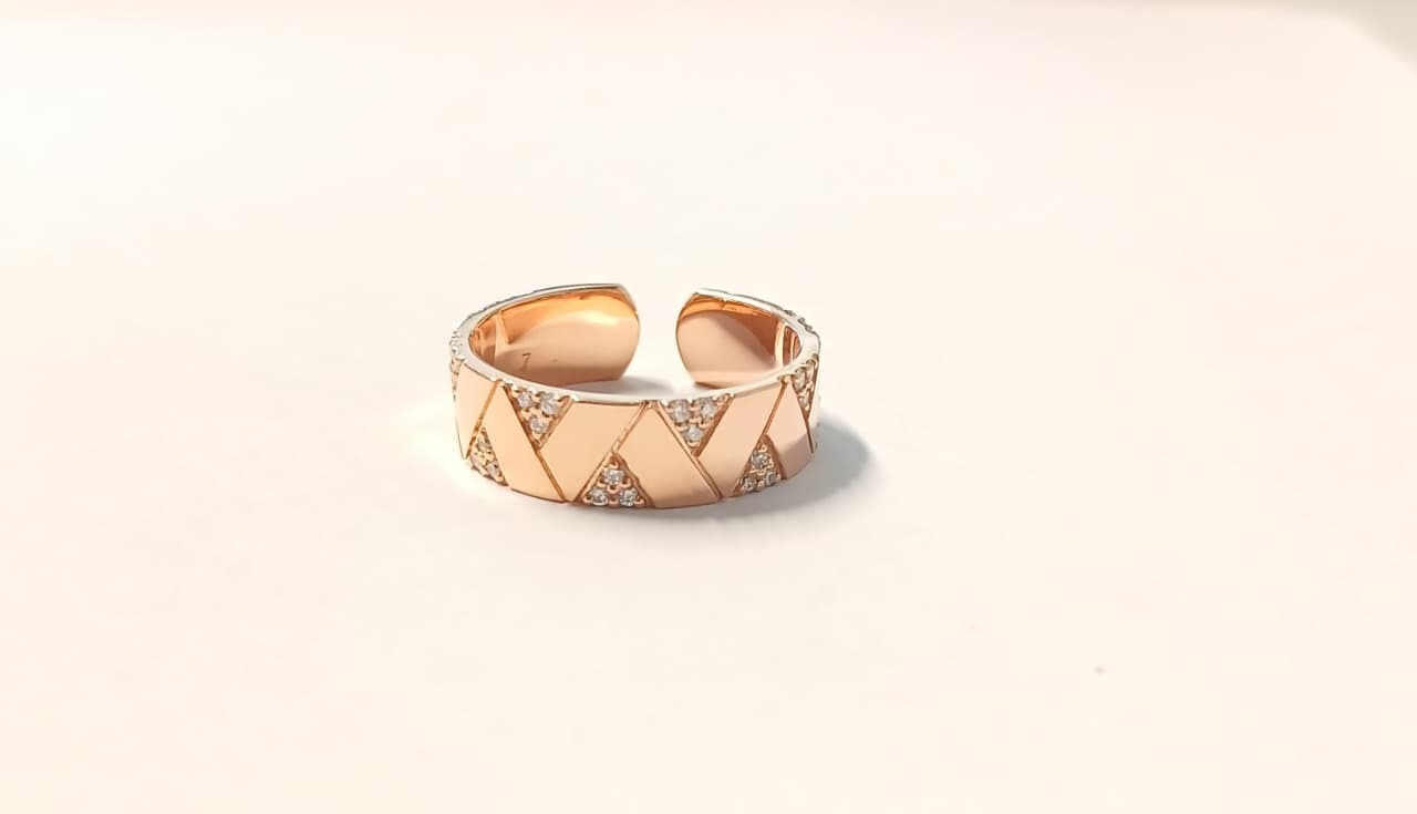 Elixir Ring with Partial Pave White Diamonds in 18kt Rose Gold by Alessa Jewelry - Sculptural band with pave accents along the front consisting of 0.22ctw of G-H/VS-VVS white diamonds set in an 18kt rose gold open shank ring that allows for flexibility in sizing. Size 7 Elixir Ring with Partial Pave White Diamonds in 18kt Rose Gold - Size 7