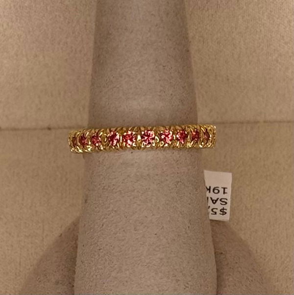 Closeup photo of Eternity Band Ring with 1.25ctw Orange Sapphires in 19kt Yellow Gold