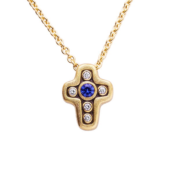 Closeup photo of Cross Pendant Necklace with Blue Sapphire and White Diamonds in 18kt Yellow Gold