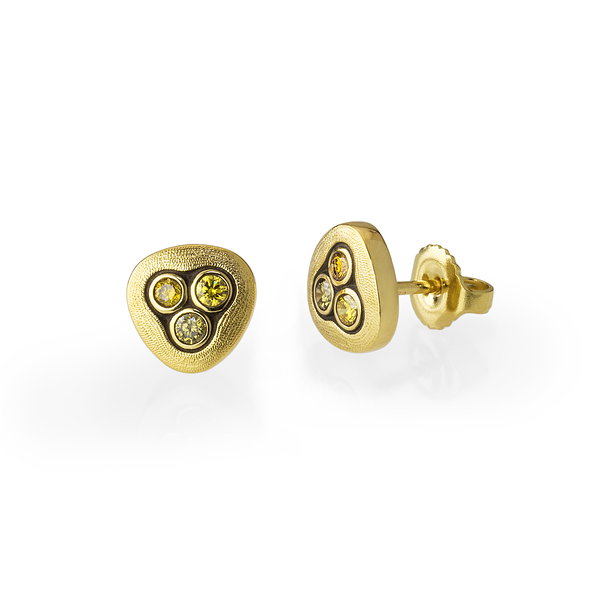 Closeup photo of Swirling Water Stud Earrings with Natural Color Diamonds in 18kt Yellow Gold