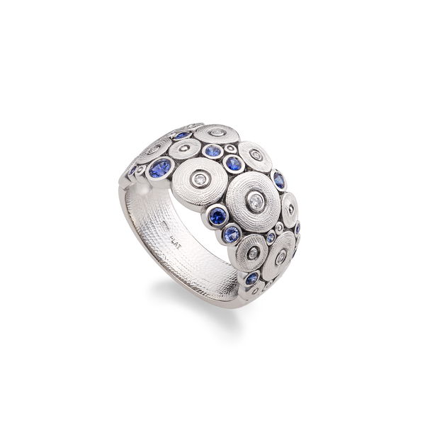 Closeup photo of Ocean Dome Ring with Blue Sapphires and White Diamonds in Platinum