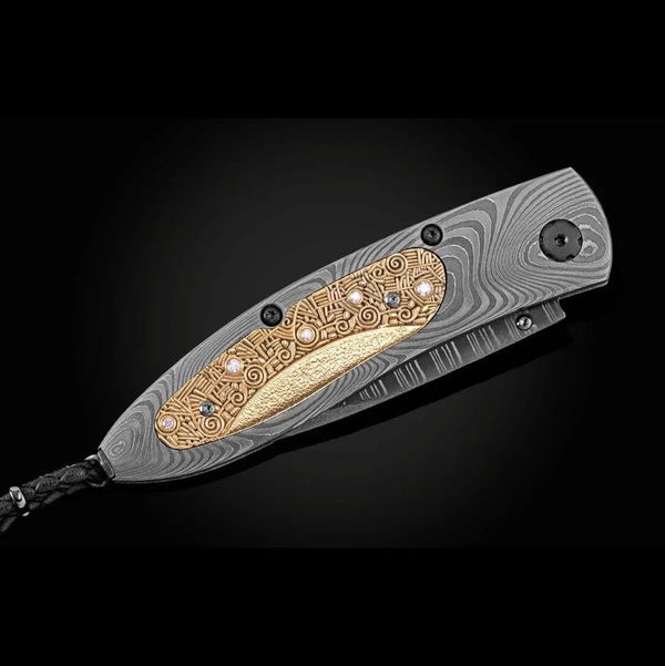 Closeup photo of Monarch Space Horizon Pocket Knife with White Diamonds in 18kt Yellow Gold and Damascus Steel