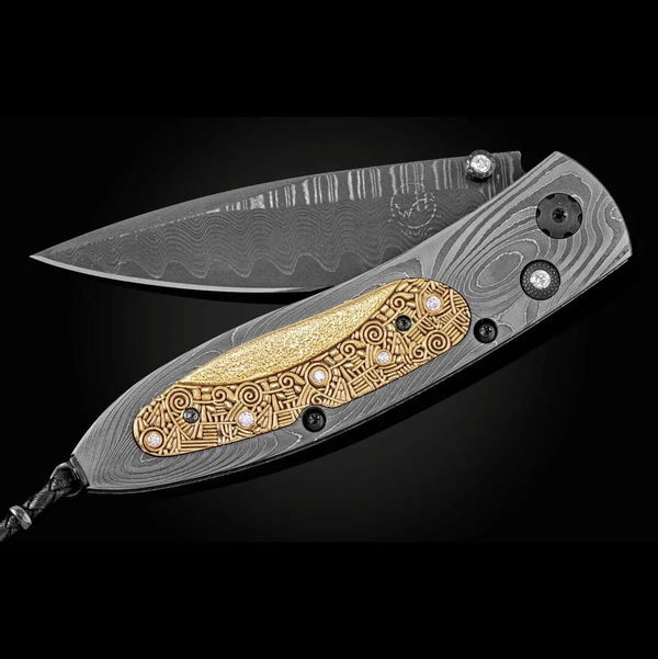 Closeup photo of Monarch Space Horizon Pocket Knife with White Diamonds in 18kt Yellow Gold and Damascus Steel